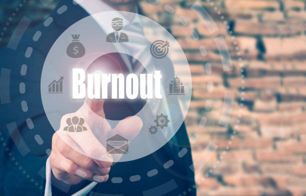 istock A businessman selecting a Burnout Concept button on a circular screen. 835234248