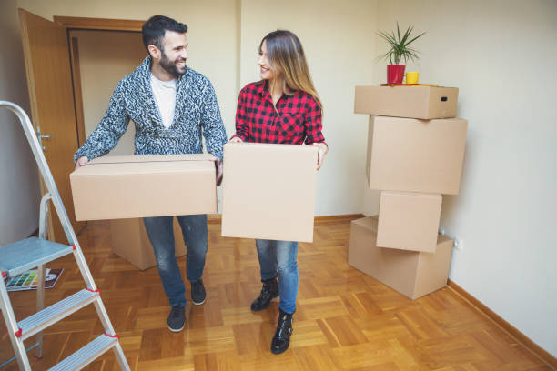 istock Couple moving into a new home 835241248