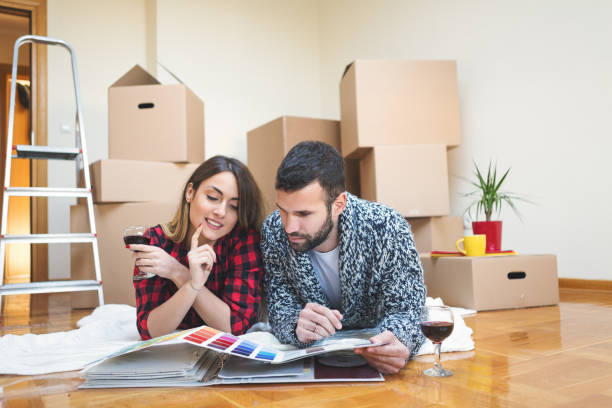istock Couple moving into a new home 835246070