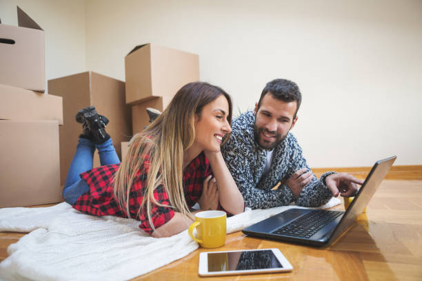 istock Couple moving into a new home 835247750