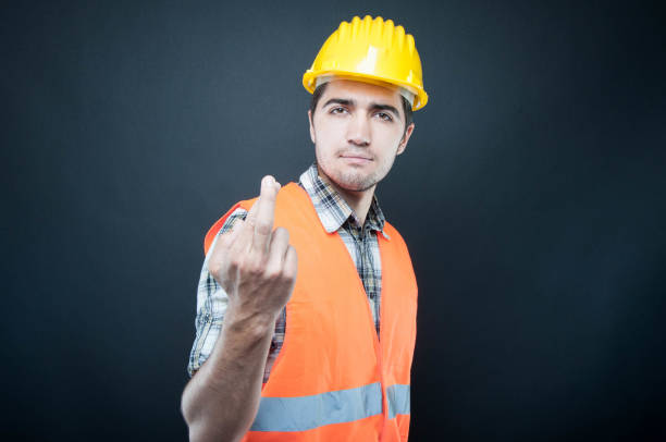 istock Constructor wearing equipment showing fingers crossed gesture 835261406