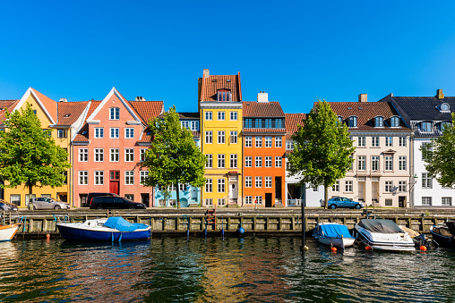 Colourful houses along canal in Downtown District of Copenhagen, Denmark.