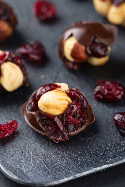 Hazelnut and cranberries in chocolate