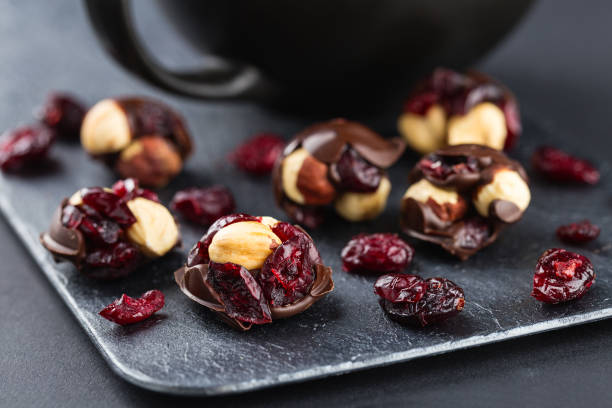 Hazelnut and cranberries in chocolate