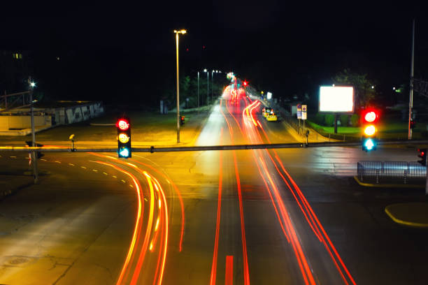 istock Car lights on road at night 835285454