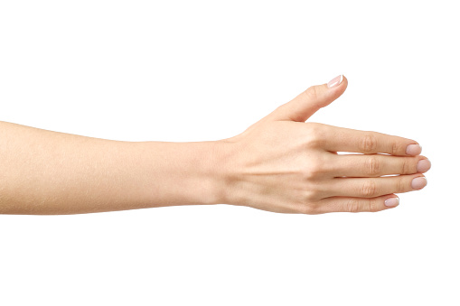 Woman's hand ready for handshaking isolated on white
