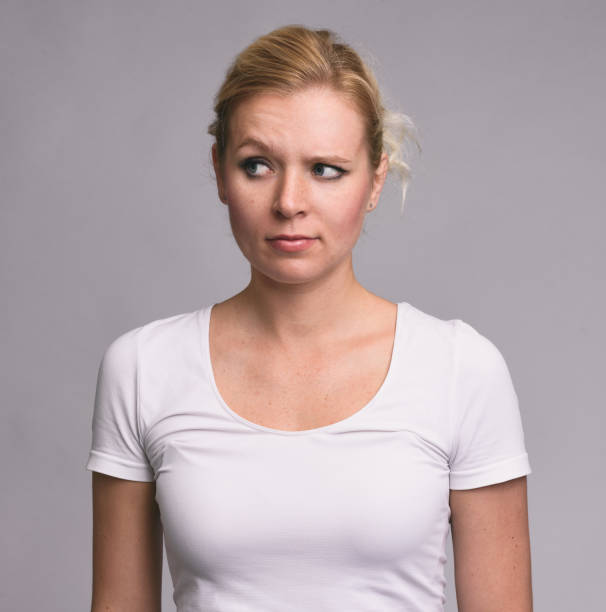 istock doubting beautiful woman with freckles 835300580