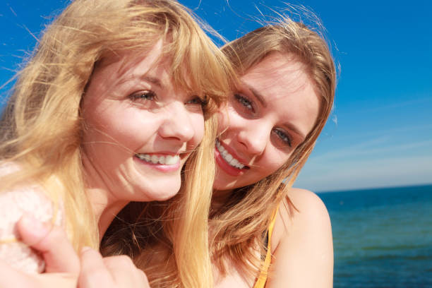 istock Two women best friends having fun outdoor 835306082