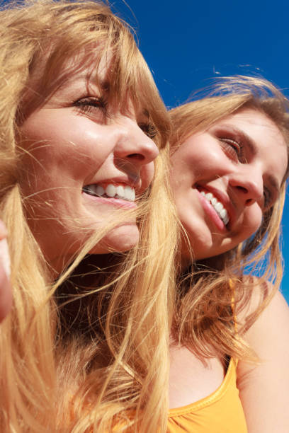 istock Two women best friends having fun outdoor 835308218