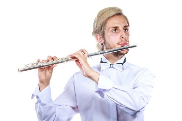 istock Male flutist playing his flute 835318788