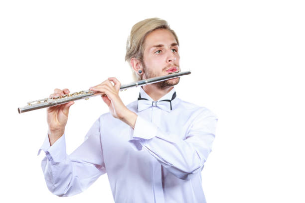 istock Male flutist playing his flute 835318892