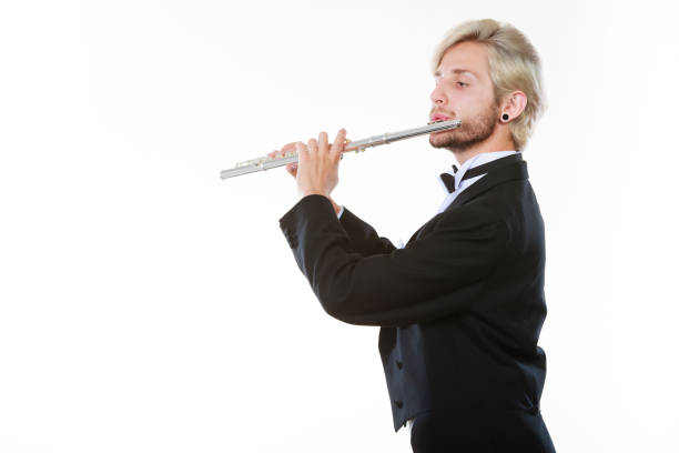 istock Male flutist wearing tailcoat plays flute 835318994
