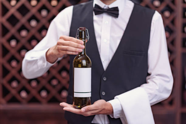 istock sommelier with bottle of wine 835324540