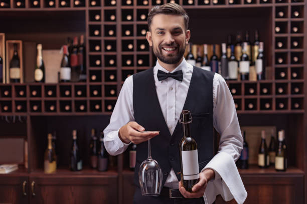 istock sommelier with wine and glass 835325374