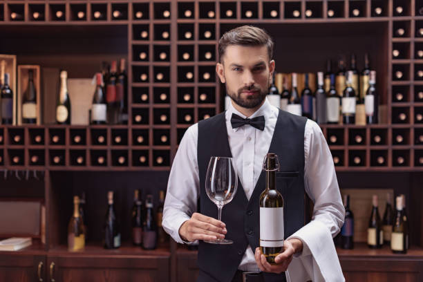 istock sommelier with wine and glass 835326162