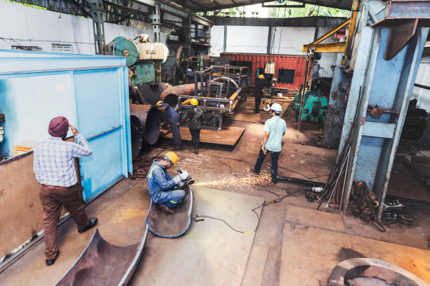 istock Workers getting their job done at a factory 835334150