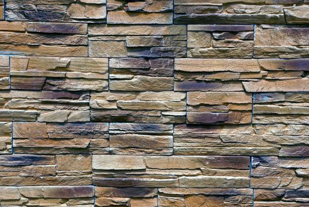 istock Stone brown texture from part of the building wall 835334232
