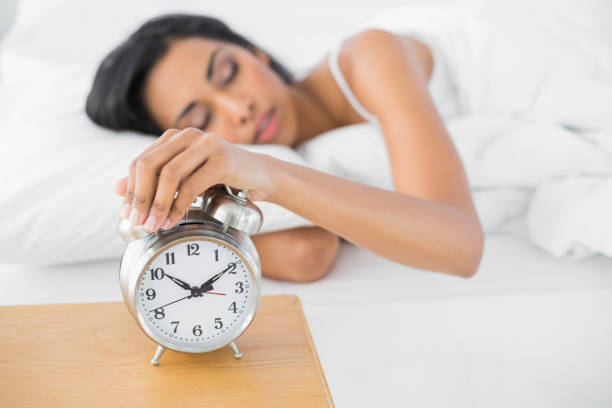 istock Beautiful exhausted woman sleeping lying in her bed 835338524