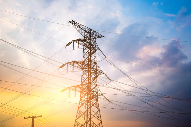 istock Impression network at transformer station in sunrise, high voltage up to yellow sky take with yellow tone, horizontal frame 835342498
