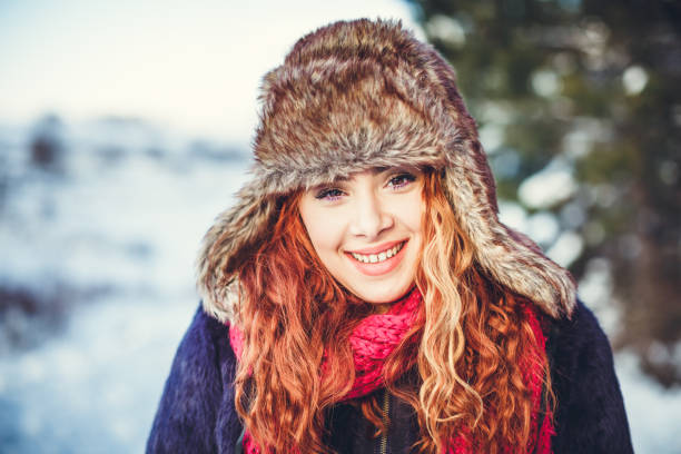 istock Happy Smiling Girl Wearing Winter Hat 835348664