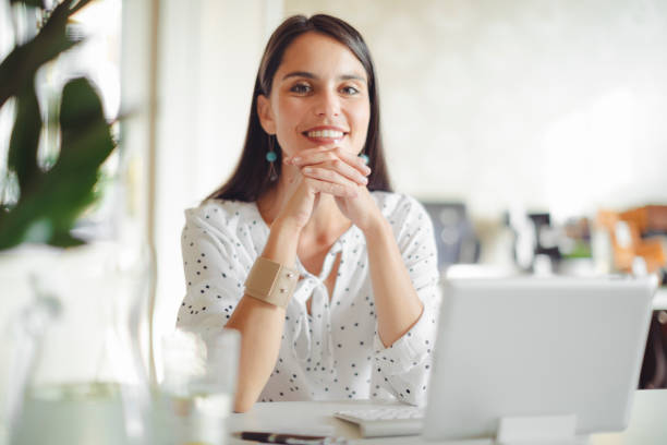 istock Young woman working in her offfice 835351288