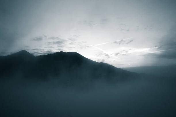 istock A beautiful monochromatic mountain view with rising clouds 835356612