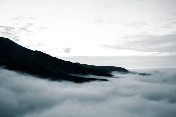istock A beautiful monochromatic mountain view with rising clouds 835357042