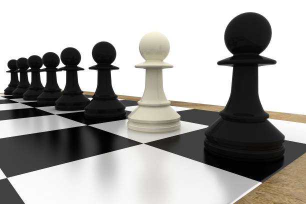 istock White pawn standing with black pawns 835359734
