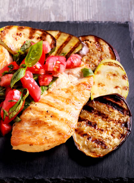 istock Grilled chicken breast and grilled vegetables 835362120