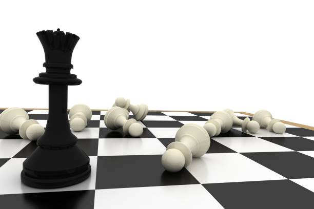 istock Black queen standing with fallen white pawns 835364688