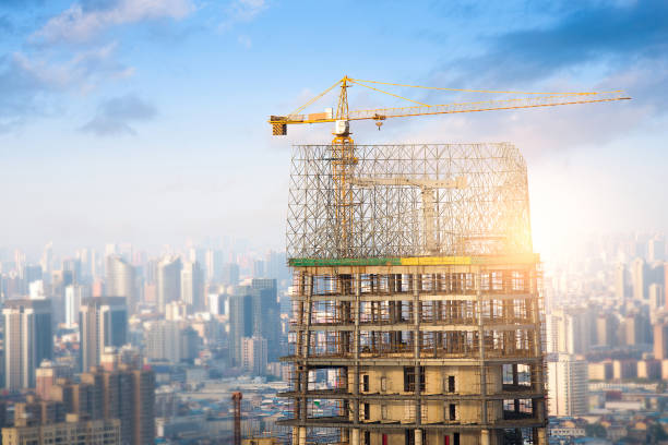istock Building of a skyscraper with two tower cranes 835372798