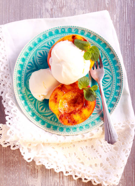 istock Grilled peaches and ice cream dessert 835375478