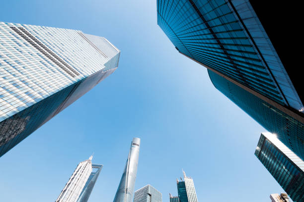istock underside panoramic and perspective view to steel glass high rise building skyscrapers, business concept of successful industrial architecture 835384572