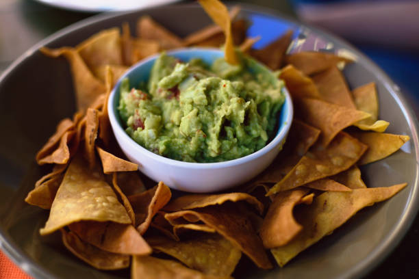 istock Guacamole with totopos, Mexican food. 835385394
