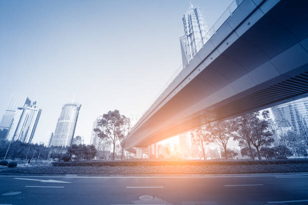 istock underside panoramic and perspective view to steel glass high rise building skyscrapers, business concept of successful industrial architecture 835385524