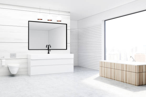 istock Bathroom with a toilet and a sink, white 835391180