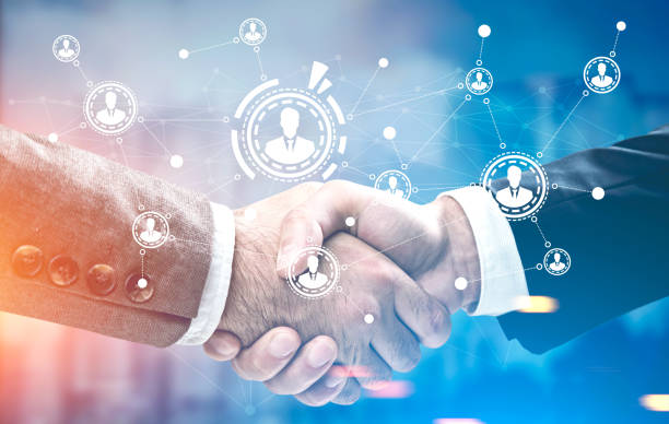 istock Close up of a handshake, cityscape, network 835394334