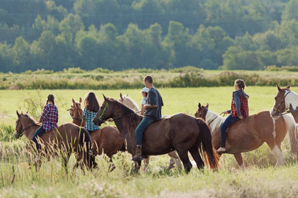 istock Group of young horse riders 835408980