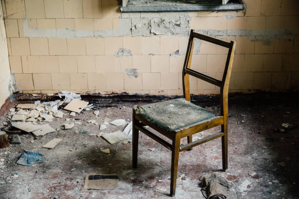 istock chair inside an old abandoned house 835414792
