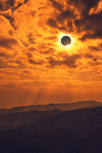istock Amazing scientific natural phenomenon. Total solar eclipse glowing on sky. 835436916