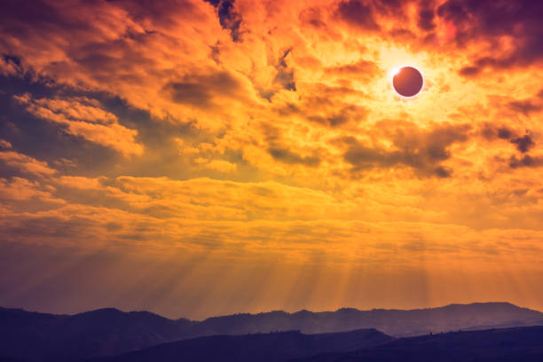istock Amazing scientific natural phenomenon. Total solar eclipse glowing on sky. 835437802