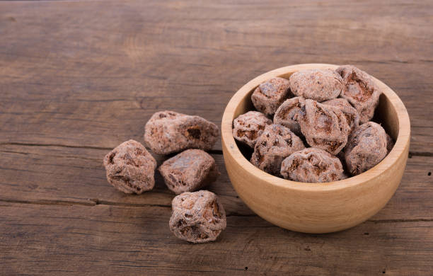 istock Salted Plum on wooden Background 835442792