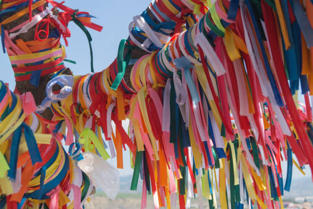 istock Wish tree with colorful decorated tapes. Dream concept. 835447362