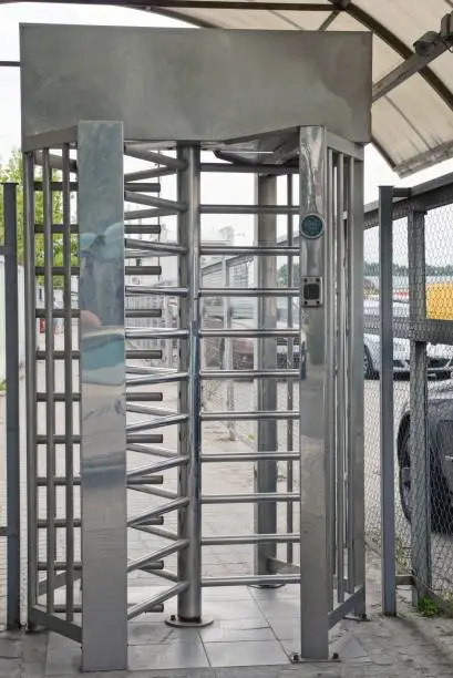 Gray iron construction from the turnstile at the entrance