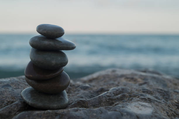 istock Pebble tower standing on the left on the big stone 835447714