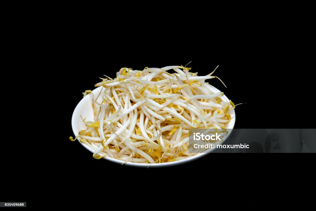 mung bean sprout on plate and black background Alfalfa Stock Photo