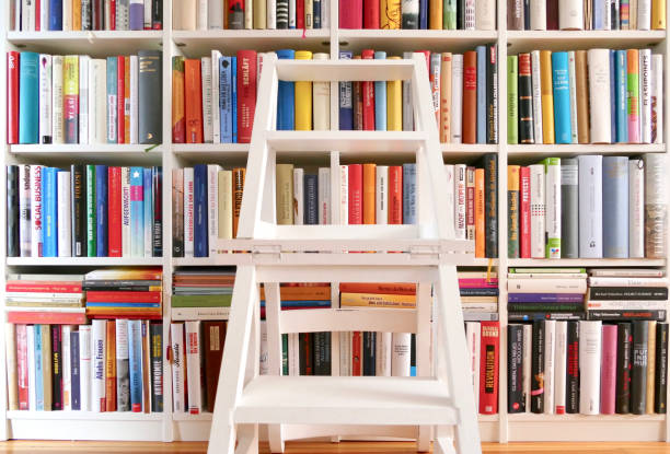 Colorful heart hanging in front of book shelves