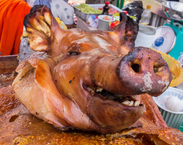 istock Head is all that remains from pig roast 835502340