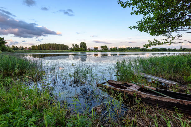 istock colorful clouds over the summer lake 835518074