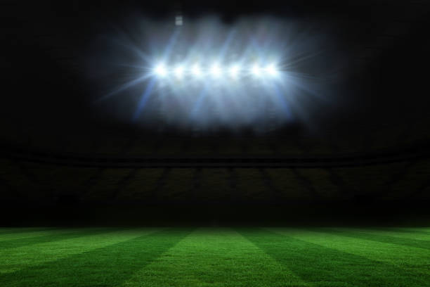istock Football pitch under spotlights 835524100